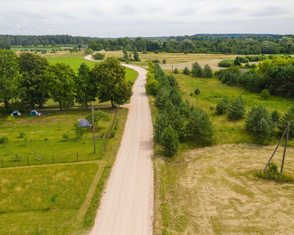 aerial-view-on-rural-countryside-road-through-agri-2022-11-14-10-29-14-utc-min (1)